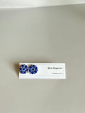 Blue and white clay flower